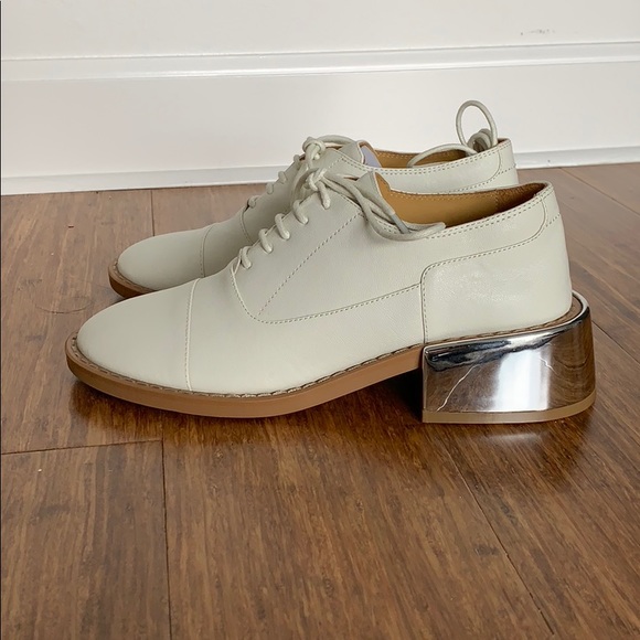 Maison Martin Margiela Shoes - MM6 Maison Margiela
SSENSE White Metal Heel 36